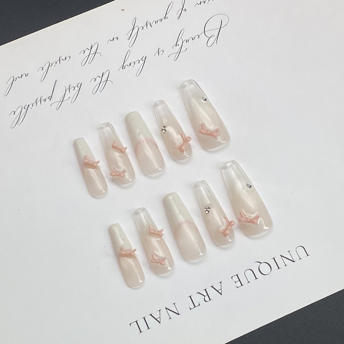 Ethereal Sheer Bow Press-on Nails in Elegant Long Almond Shape  | Wearing Armor Nail | Gel Nail Strips