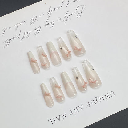 Ethereal Sheer Bow Press-on Nails in Elegant Long Almond Shape  | Wearing Armor Nail | Gel Nail Strips
